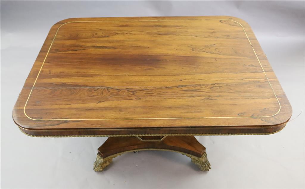 A Regency brass mounted rosewood breakfast table, W.4ft 6in. D.3ft 6in. H.2ft 6in.